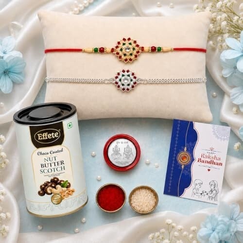 DeoDap Set of 2 Rakhi for Brother – Gold & Silver Colour Flower Design with Choco Coated Butterscotch Chocolate 96gm, Pooja Coin, Roli Chawal & Card | Rakhi with Chocolate Combo for Raksha Bandhan